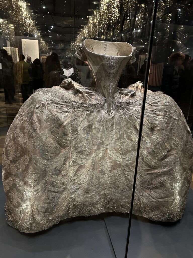 Marie Antoinette's silver 18th century wedding dress in the French style with extended hips 