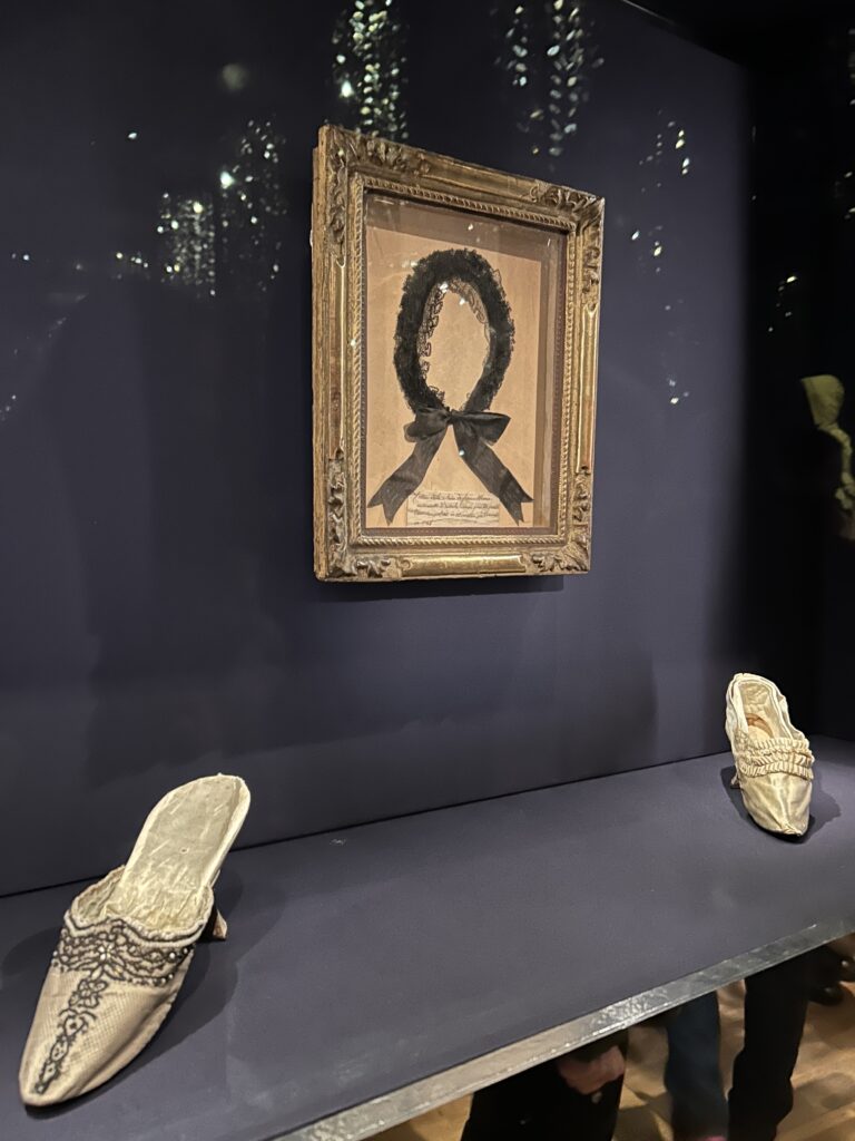 satin mules from 18th century and a garland